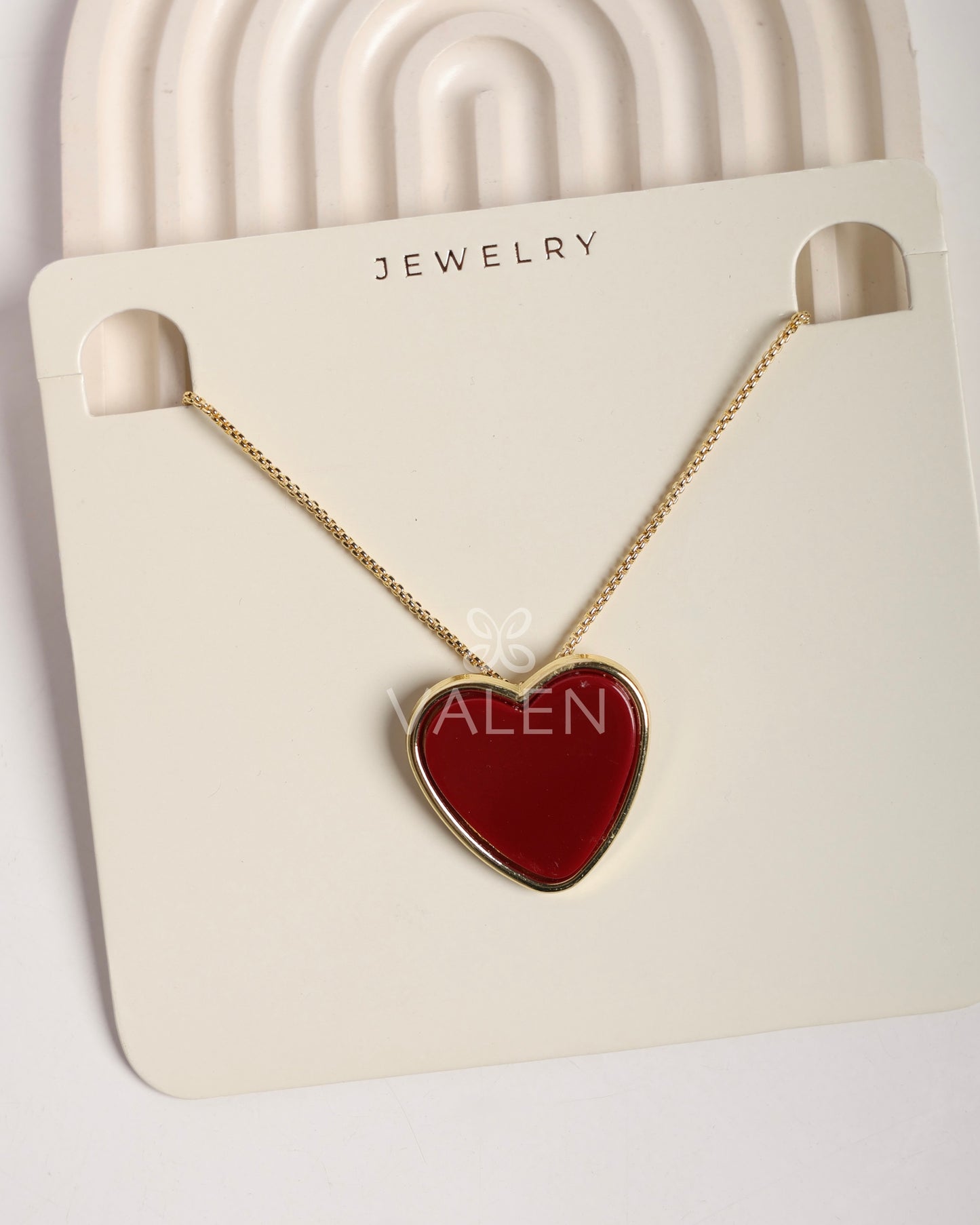 Collar corazón vinotinto