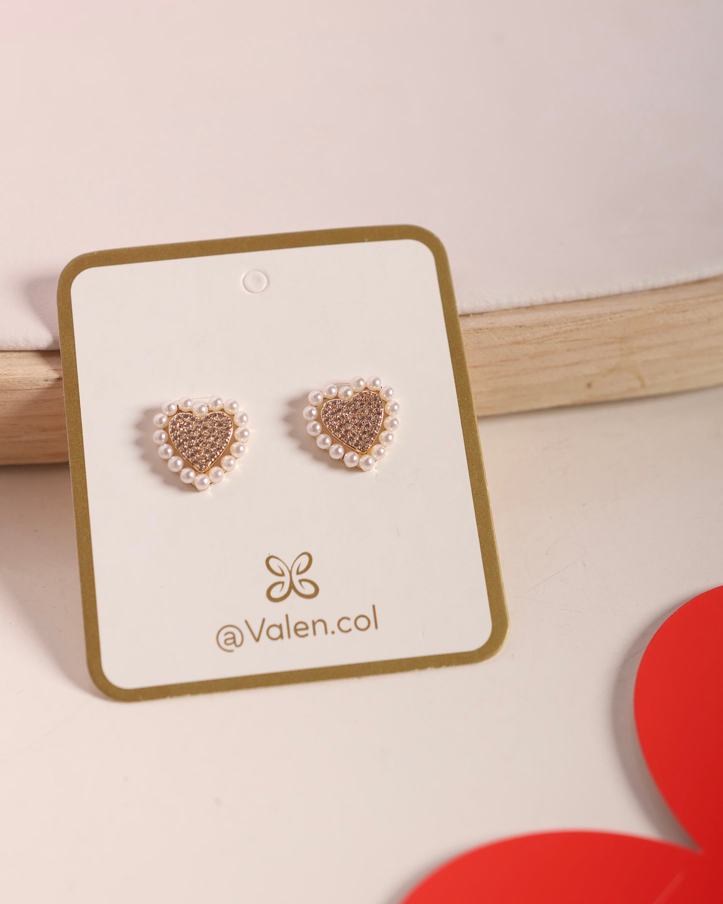 Topos corazón borde perlas