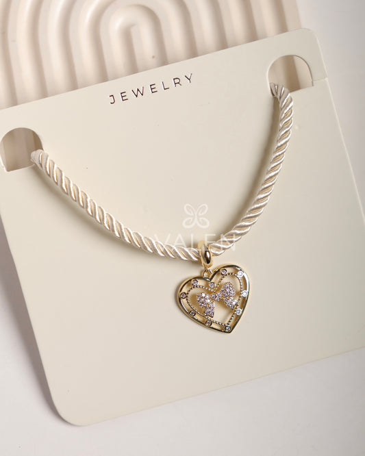 Collar corazón moño