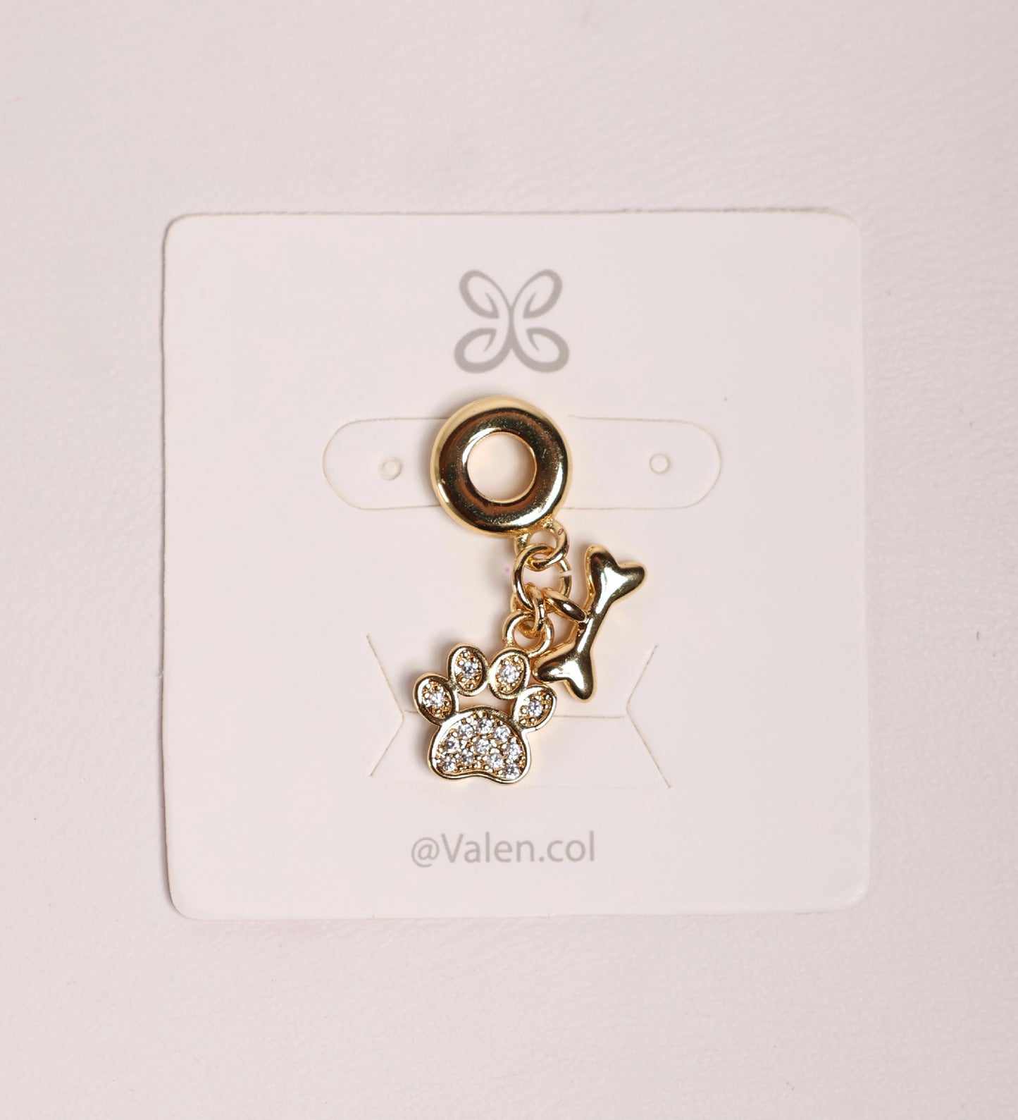 Charm huella y hueso perro