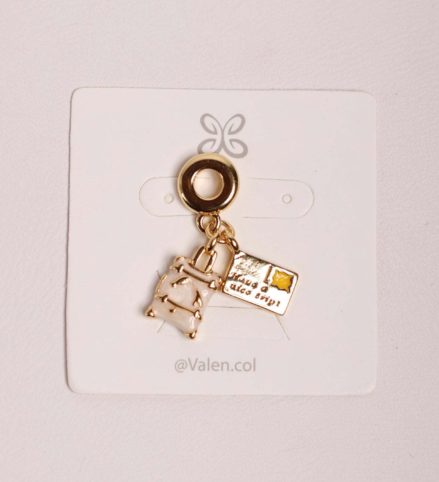 Charm maleta y ticket
